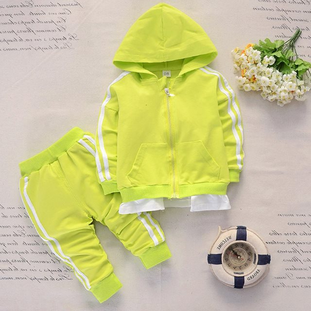 Children's sports suit for infants in bright yellow with zip-up hoodie and matching pants.
