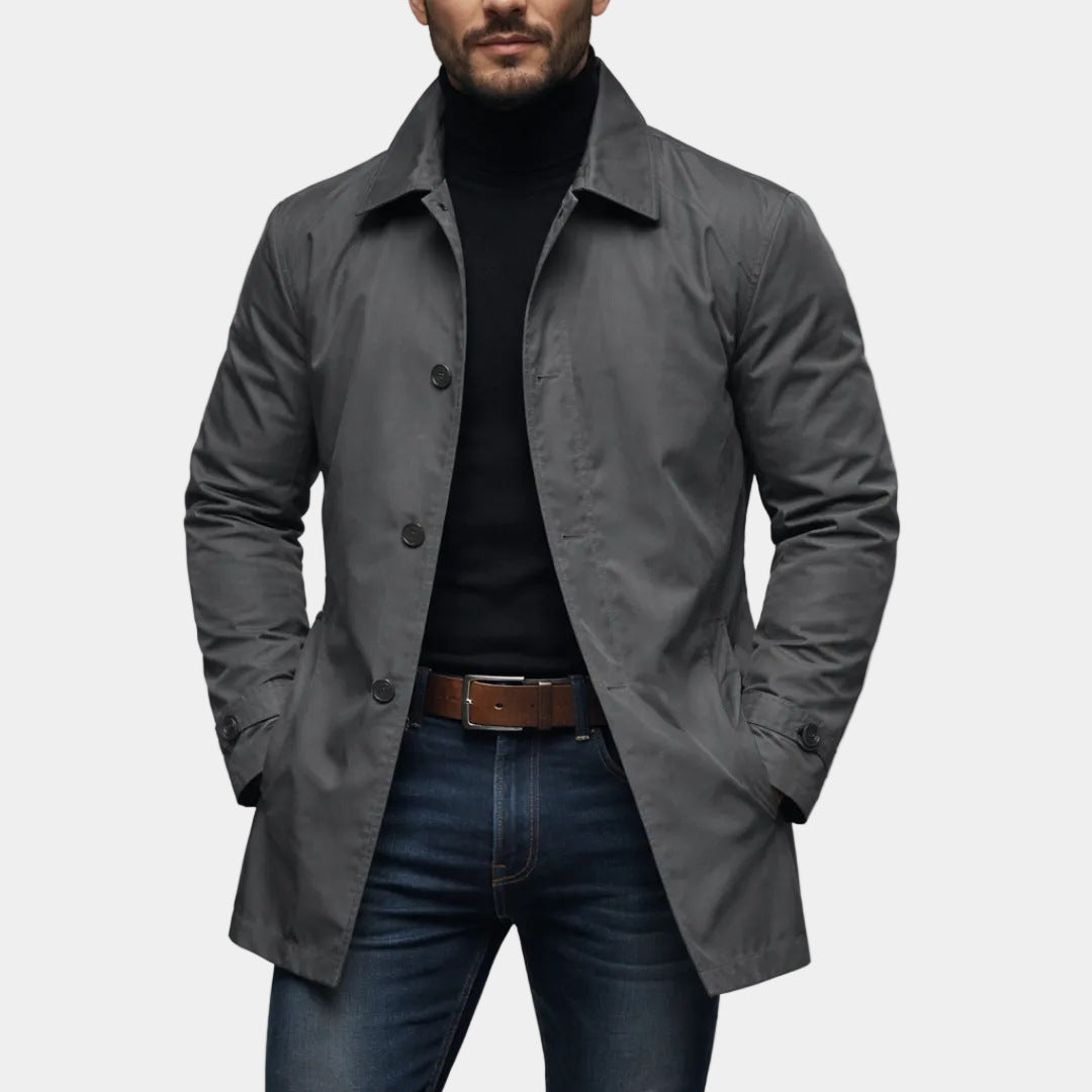 Mens retro waterproof cardigan coat displayed in a relaxed fit, stylishly worn over a black turtleneck.
