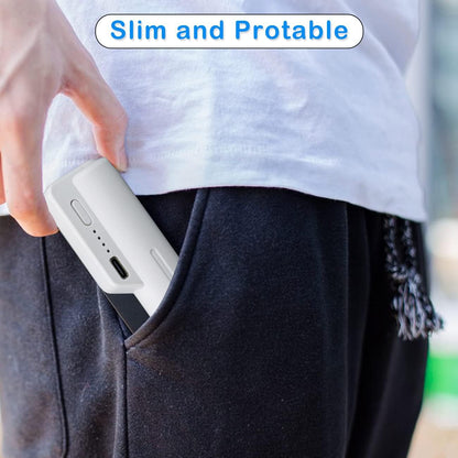 A person holding a portable VR power bank in their pocket, showcasing its slim and portable design.