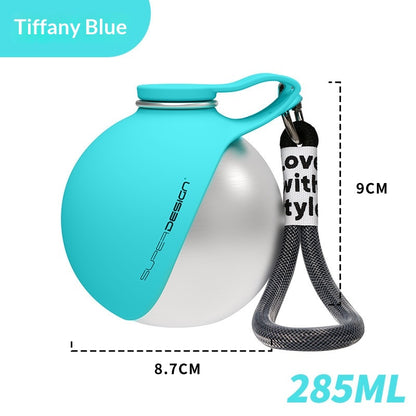 Portable dog water bottle in Tiffany Blue color, featuring built-in drinking bowl and leash for easy travel.