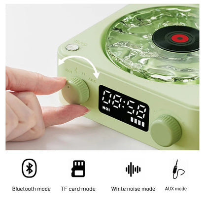 Retro Turntable Wireless Bluetooth Speaker controls and display showcasing Bluetooth, TF card, white noise, and AUX modes.
