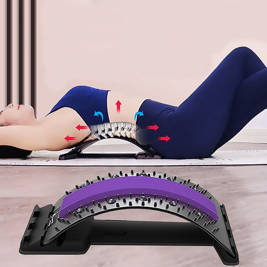 Woman using a lumbar massage board for health care to relieve back pain and improve flexibility.