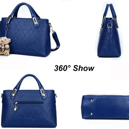 360° view of women's PU leather handbag set, showcasing a blue satchel with a teddy charm and different angles.