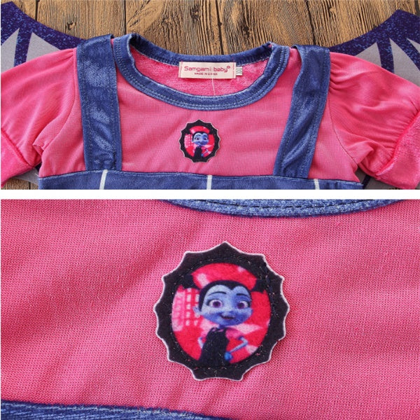Cute princess Halloween dresses for toddlers featuring a pink and blue design with an adorable character badge.