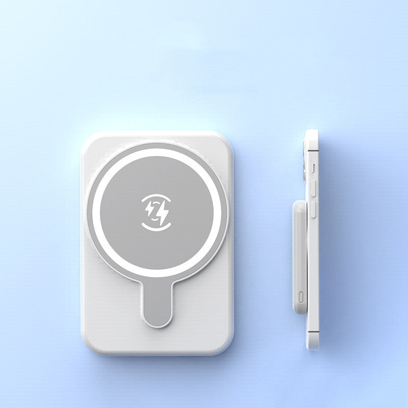 Mini Magnetic Power Bank 5000mAh Wireless on a light blue background next to an iPhone.