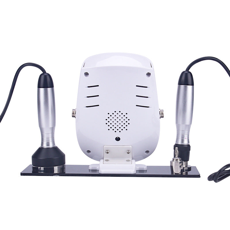 Household electric skin peeling beauty device with control panel and dual applicators.