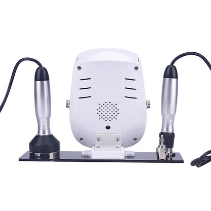 Household electric skin peeling beauty device with control panel and dual applicators.