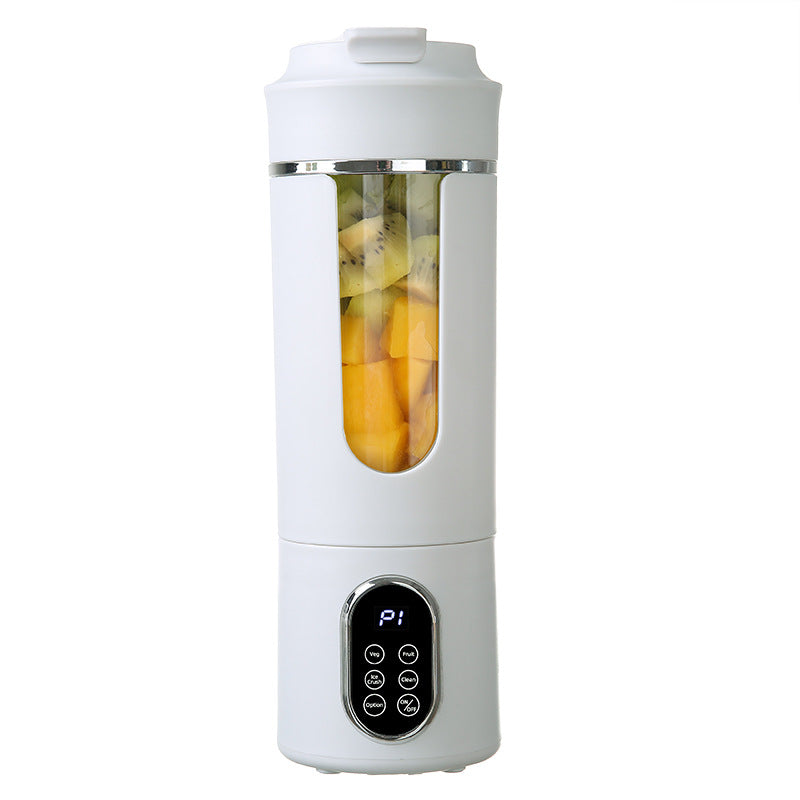 Portable rechargeable juice blender in white, showcasing fruits inside for smoothies, perfect for travel and home use.
