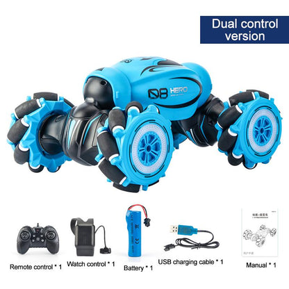 Gesture sensing remote control car in blue color with accessories like remote, battery, and USB charger.