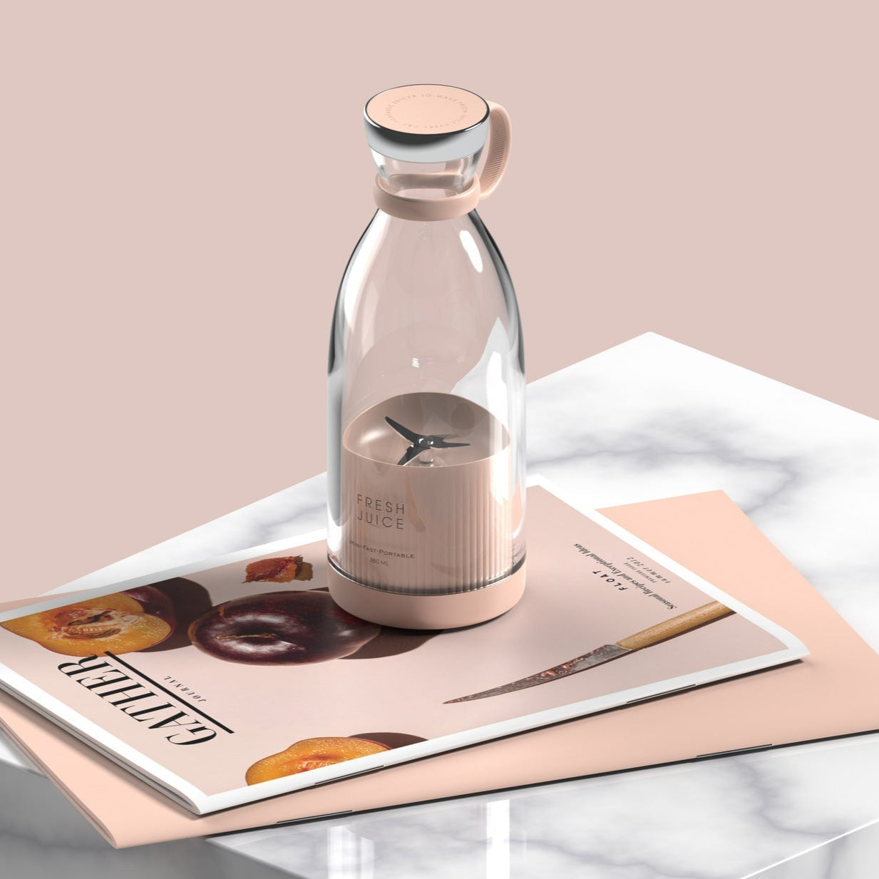 Portable Juicer Blender featured in a stylish design on a marble countertop with fruit-themed magazine.