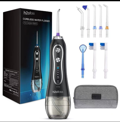 H2ofloss portable water flosser in black with nozzles and portable box package.