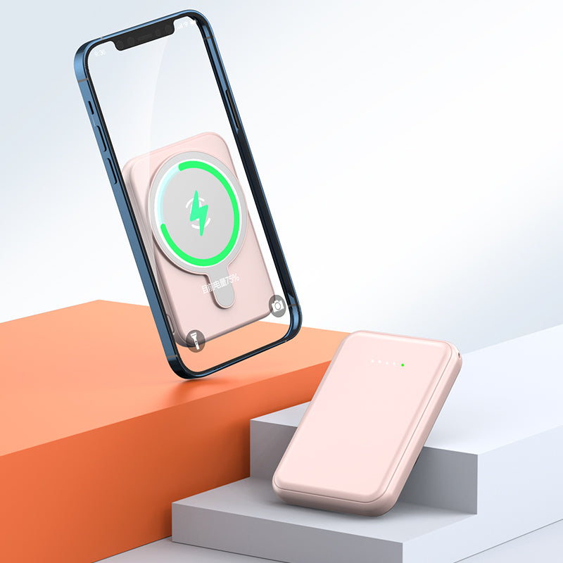 Mini Magnetic Power Bank 5000mAh Wireless showcased with a smartphone and its magnetic charging feature.