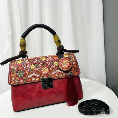 Large capacity casual bag for women with vibrant floral embroidery and a stylish handle.