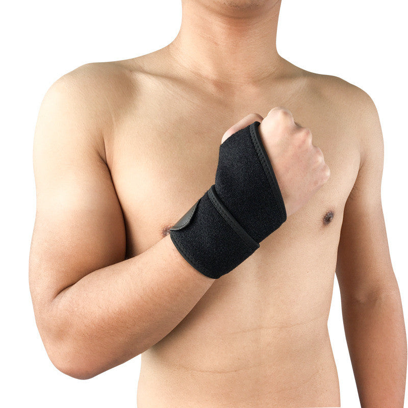 Black neoprene basketball wristband neoprene worn on bare arm for sports protection.