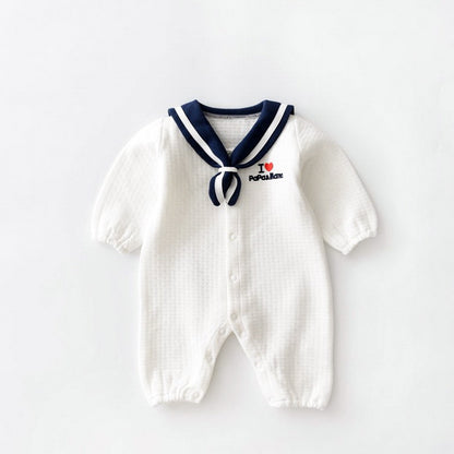 Navy style baby onesies featuring a sailor collar, buttons, and soft cotton fabric for newborns.