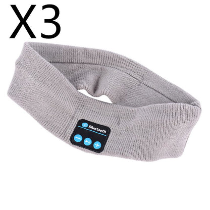 Bluetooth sports music headband in grey color with control buttons for convenient audio playback.