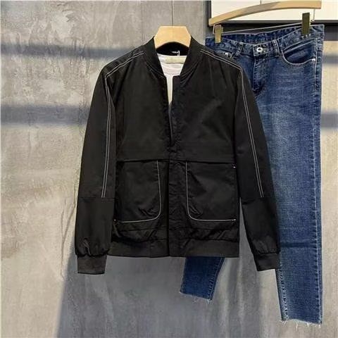 Men's windproof military style jacket displayed with blue jeans on hanger, showcasing thick fabric design.
