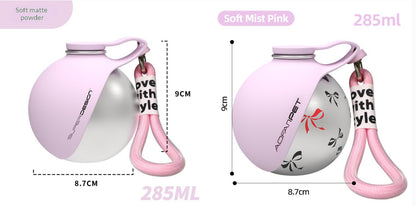 Portable dog water bottle in soft mist pink, 285ml, with a convenient design for outdoor pet hydration.
