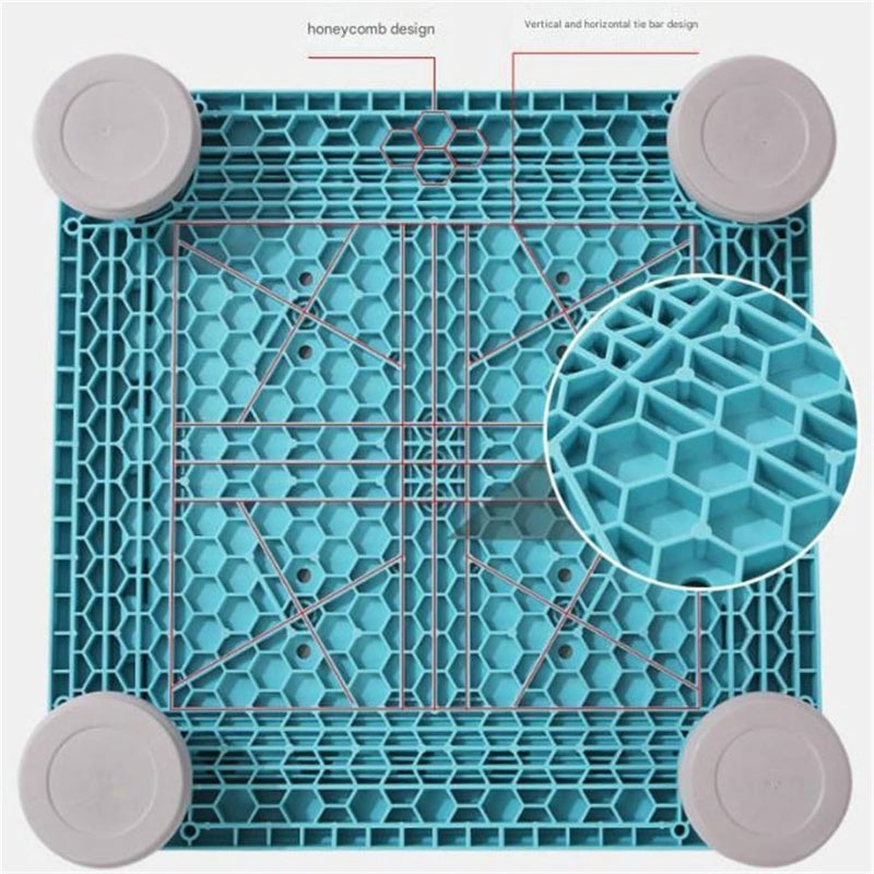 Detailed view of a honeycomb design plastic storage crate with a blue color and gray rounded corners.
