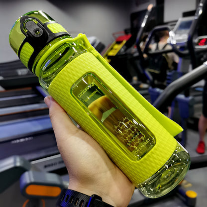 Portable sport water bottle in hand, designed from copolymer polyester, suitable for various temperatures.
