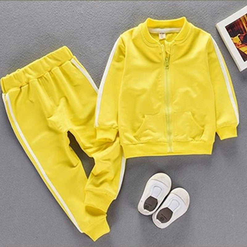 Children's sports suit for infants in bright yellow color with stylish details.