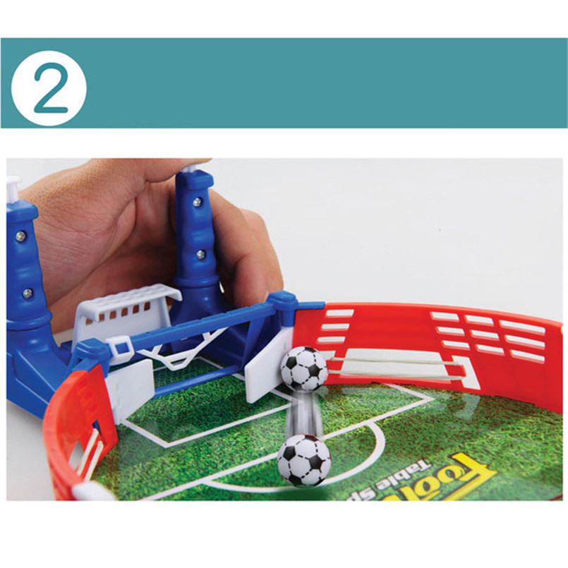 Mini Football Board Match Game featuring portable soccer tabletop game with hand and players scoring goals.