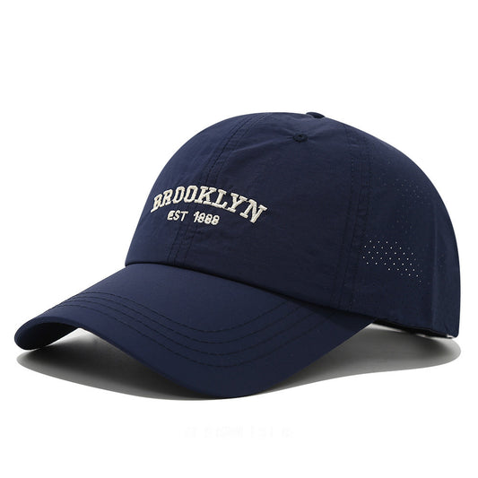 Men's and women's slim-fit embroidered baseball cap in navy blue with Brooklyn logo for stylish daily wear.
