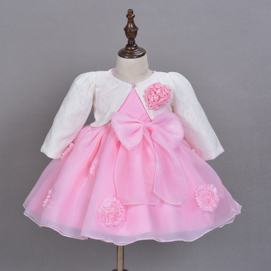 pink princess dress for girls featuring a floral bodice and bow, perfect for infants and toddlers.