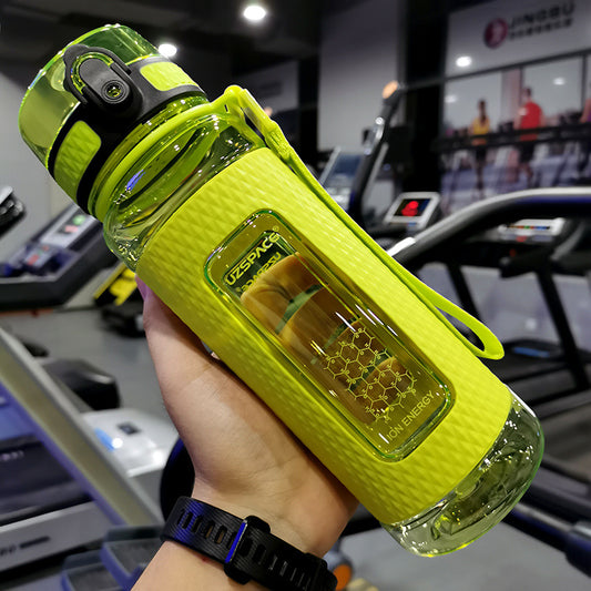 Portable sport water bottle in vibrant yellow, designed for fitness enthusiasts with ergonomic grip.