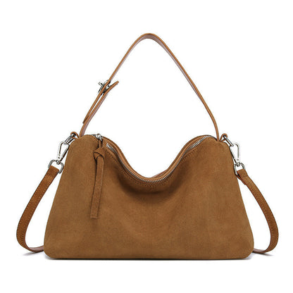Genuine suede leather tote bag in caramel color with a double shoulder strap.