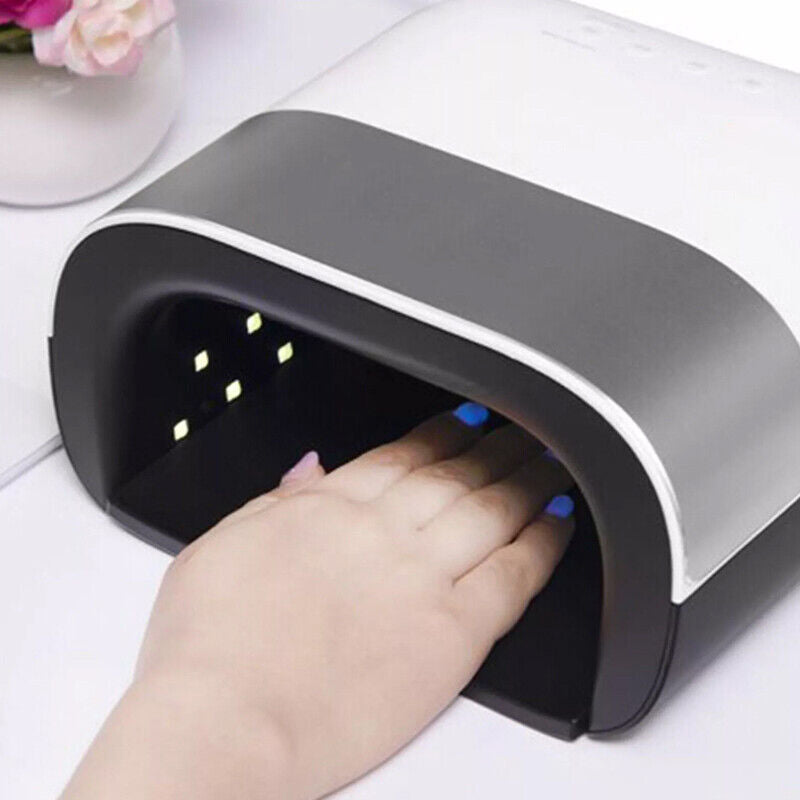 48W UV-LED nail dryer in use, drying nails under LED light for a perfect manicure.