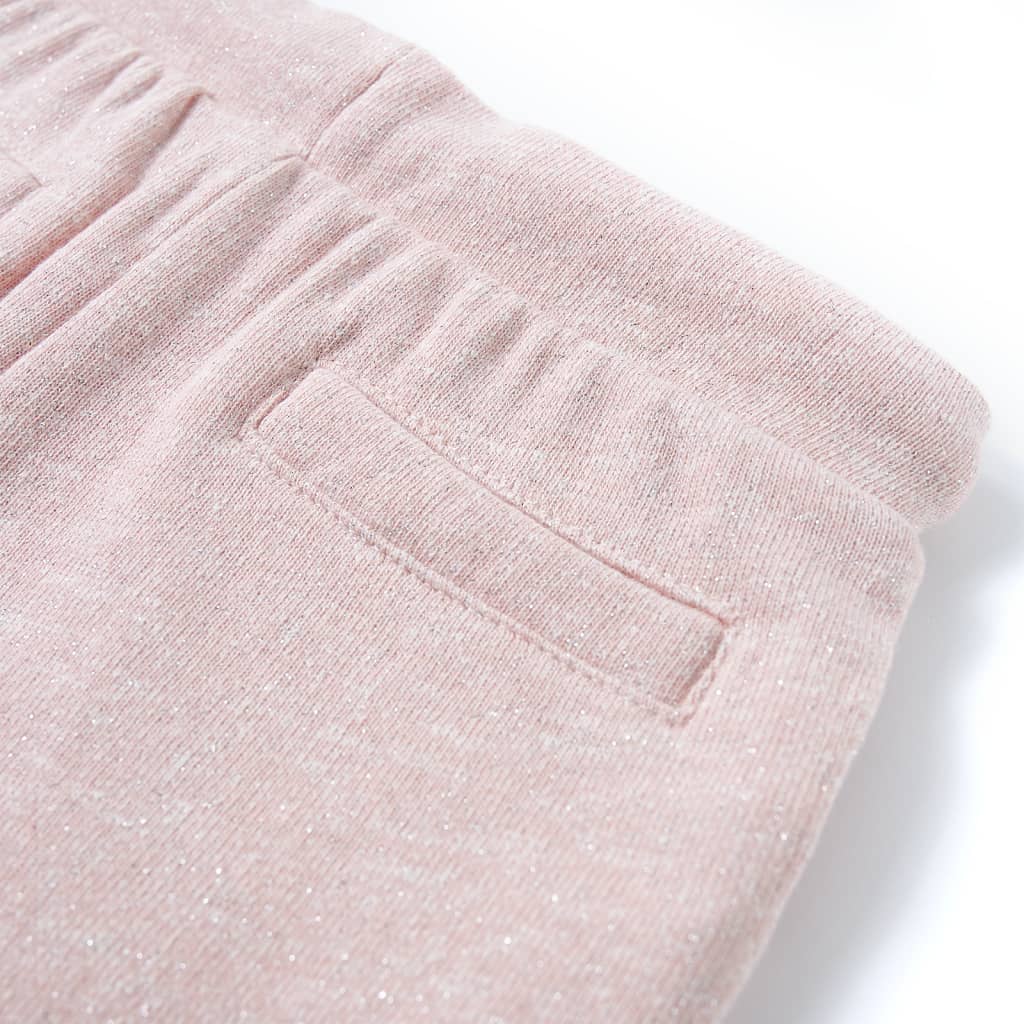 light pink children's shorts with drawstring, featuring elastic waistband and inset pockets.