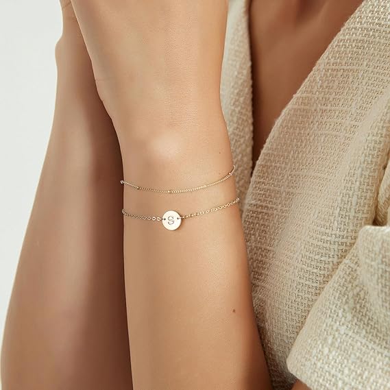 14K Gold Dainty Gold Bracelets featuring two delicate chains with a small charm, ideal for layering.