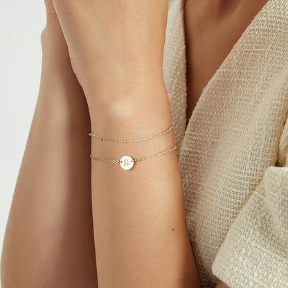 14K Gold Dainty Gold Bracelets featuring two delicate chains with a small charm, ideal for layering.