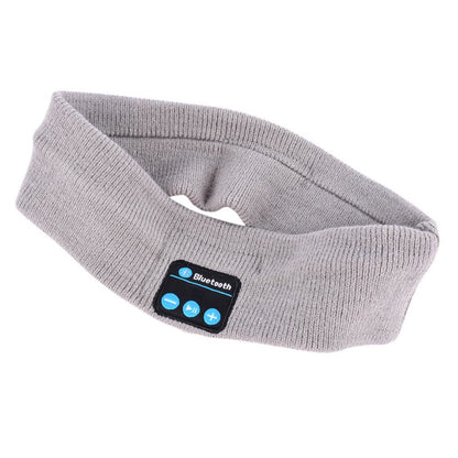 Bluetooth sports music headband in gray with built-in controls for audio and calls.