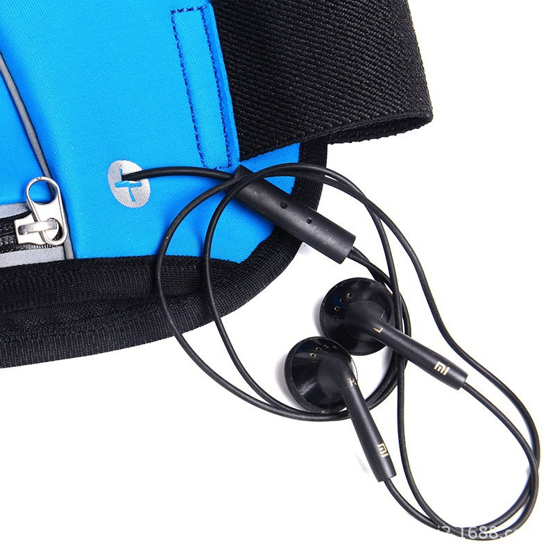 Close-up of a blue fashion sports leisure waistpack with earphones attached, ideal for leisure running waistpack.