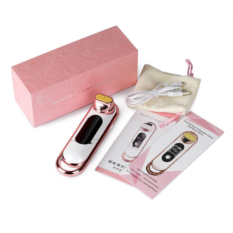 Electric skin firming beauty instrument with packaging, user manual, and accessories for skincare enhancement.
