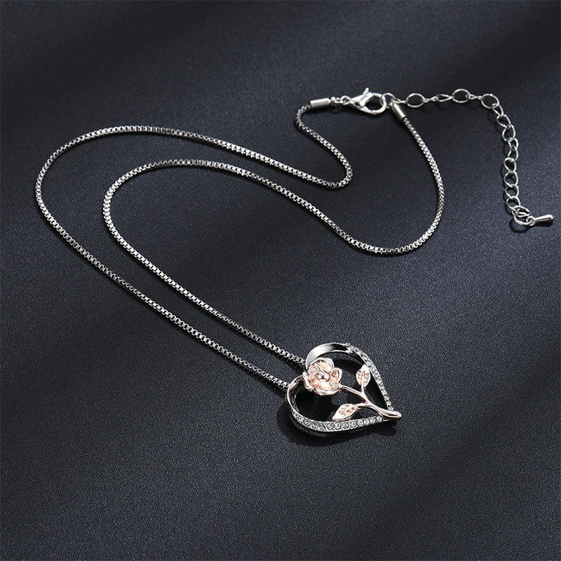 Zircon heart rose silver necklace for women featuring a delicate flower design and a sleek chain.