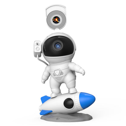 Rocket astronaut projector lamp standing on a blue rocket with a starry sky projector atop.