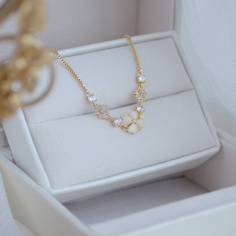 Versatile Japanese and Korean minimalist cat eye stone bracelet displayed in elegant jewelry box.