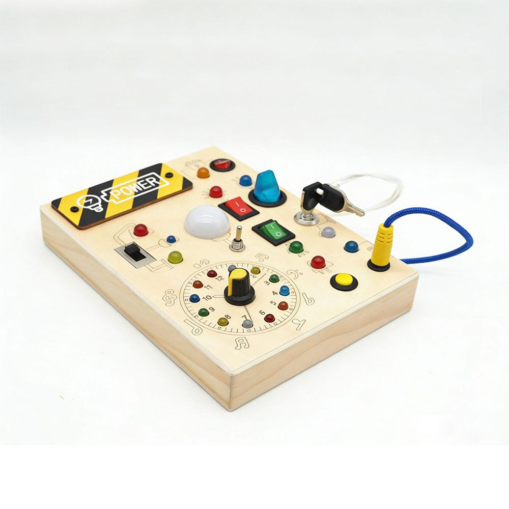 Montessori busy board for toddlers featuring colorful buttons and interactive elements for sensory play.