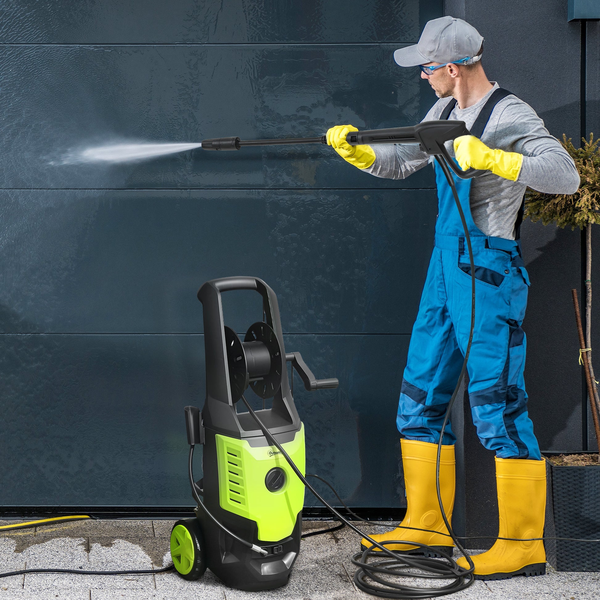Portable electric pressure washer 2200W in action, cleaning a surface with high pressure water jet.