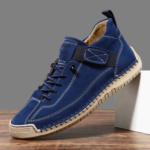 plus size leather casual boots in dark blue with rubber sole and manual stitching design.
