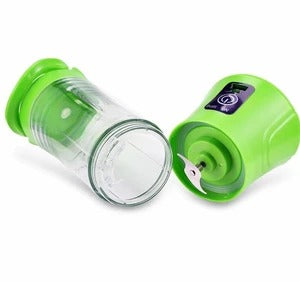 USB rechargeable portable juicer with green lid and clear blending cup for smoothies and juices.