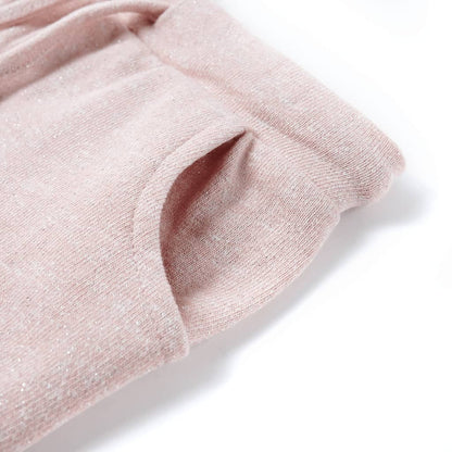 light pink children's shorts with drawstring showing waistband and pocket detail