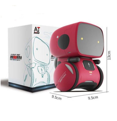Interactive educational robot for children in pink with box dimensions shown.