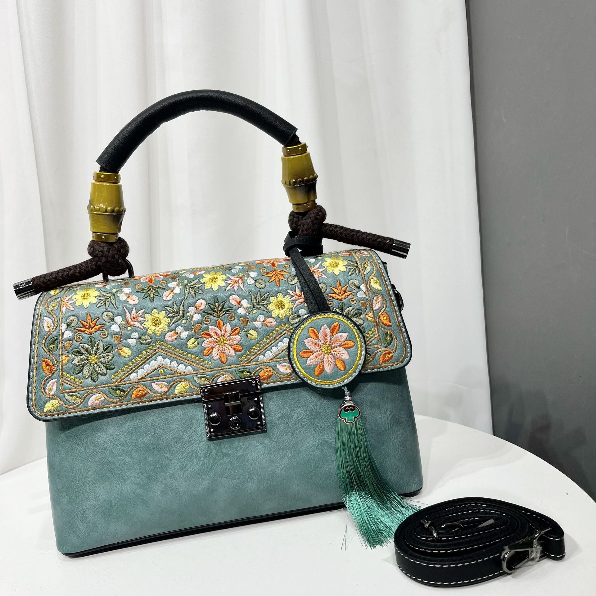 Casual Textured Large-Capacity Bag For Women, featuring floral embroidery and a stylish tassel.