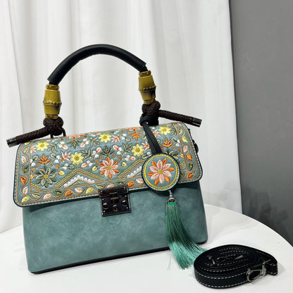Casual Textured Large-Capacity Bag For Women, featuring floral embroidery and a stylish tassel.