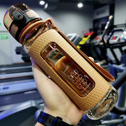 Portable sport water bottle in hand, made of copolymer polyester plastic, suitable for various temperatures.