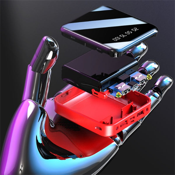 portable mirror power bank 20000 mAh disassembled showing internal components on a shiny hand